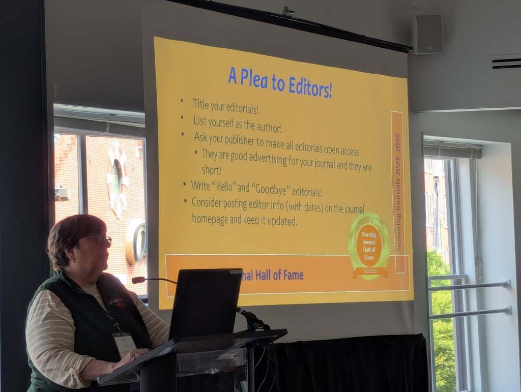 A speaker presenting at the Nursing Journal Hall of Fame Ceremony, discussing editorial tips, with a slide displaying key points.